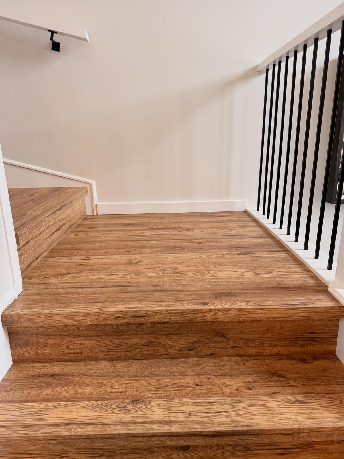 Laminate landing and adjoining stair treads.